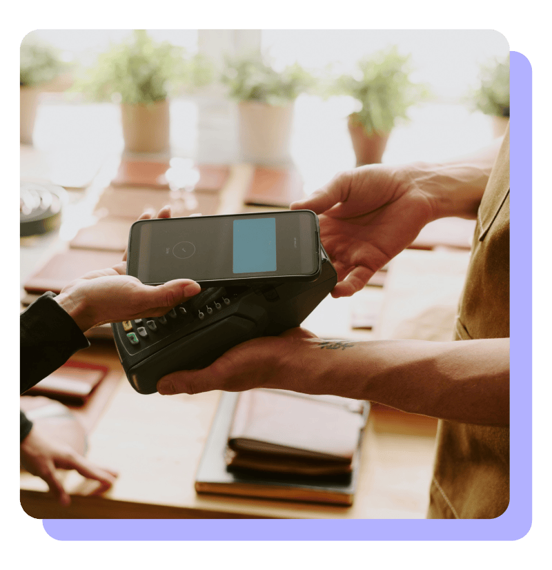 Phone tap to pay over the counter at a retail store Phone tap to pay over the counter at a retail store