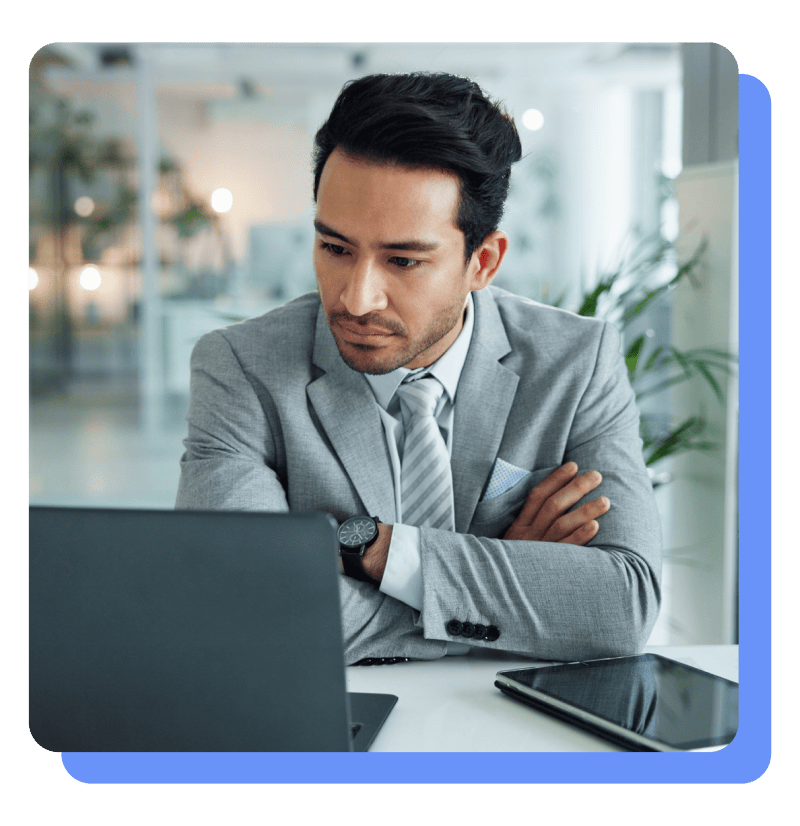 Professional man staring at computer Professional man staring at computer