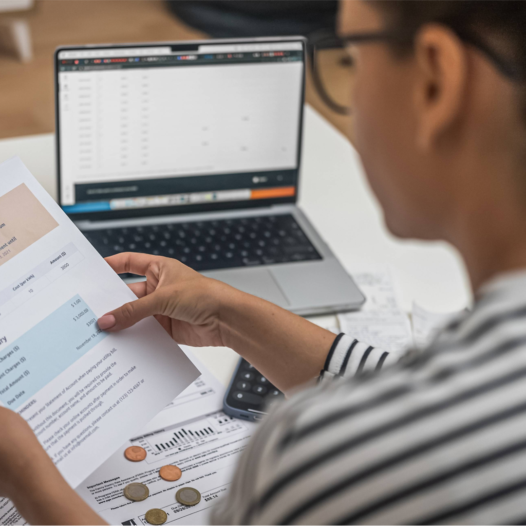 Professional woman on computer making payments