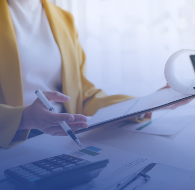 Professional woman working through compliance documents Professional woman working through compliance documents