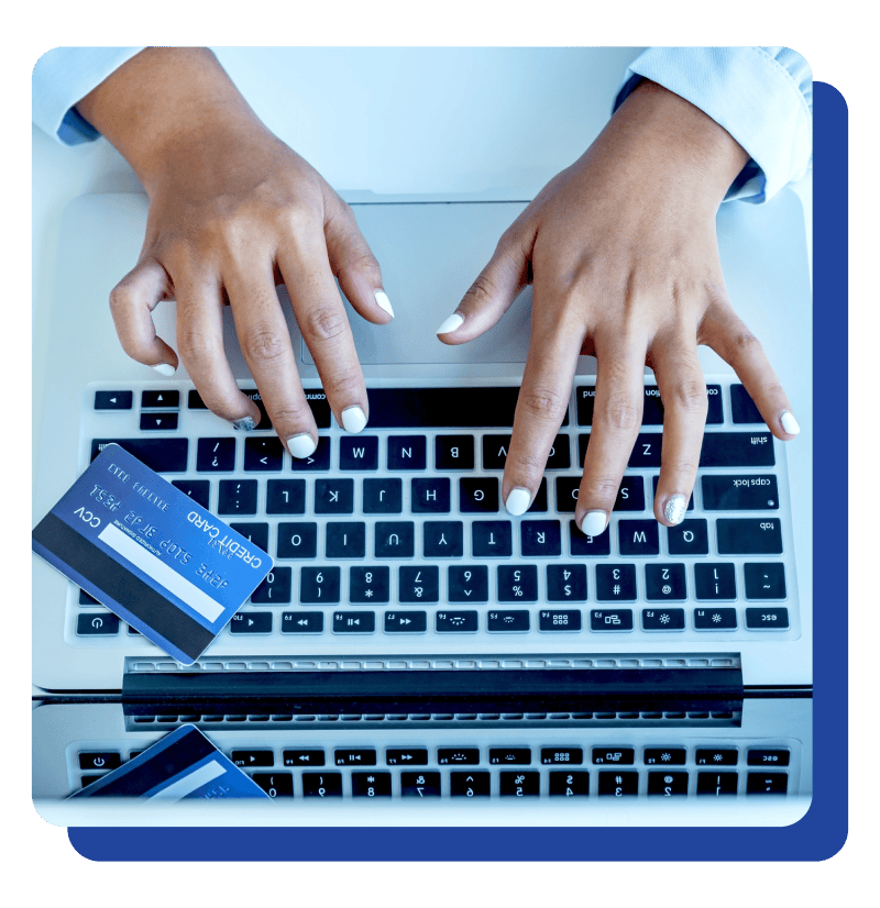 Womans hands on a computer typing Womans hands on a computer typing